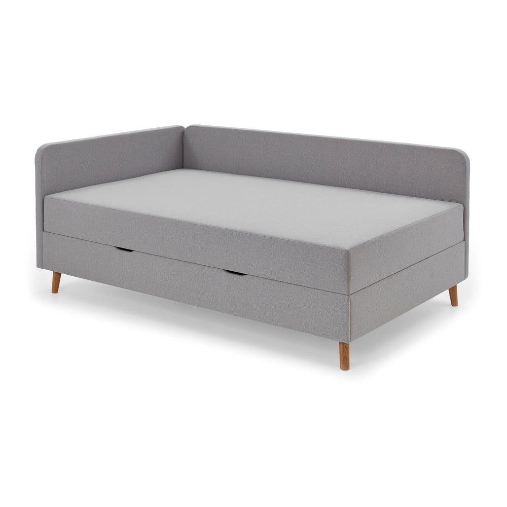 Világosszürke kárpitozott egyszemélyes ágy tárolóhellyel 120x200 cm Cabana – Meise Möbel